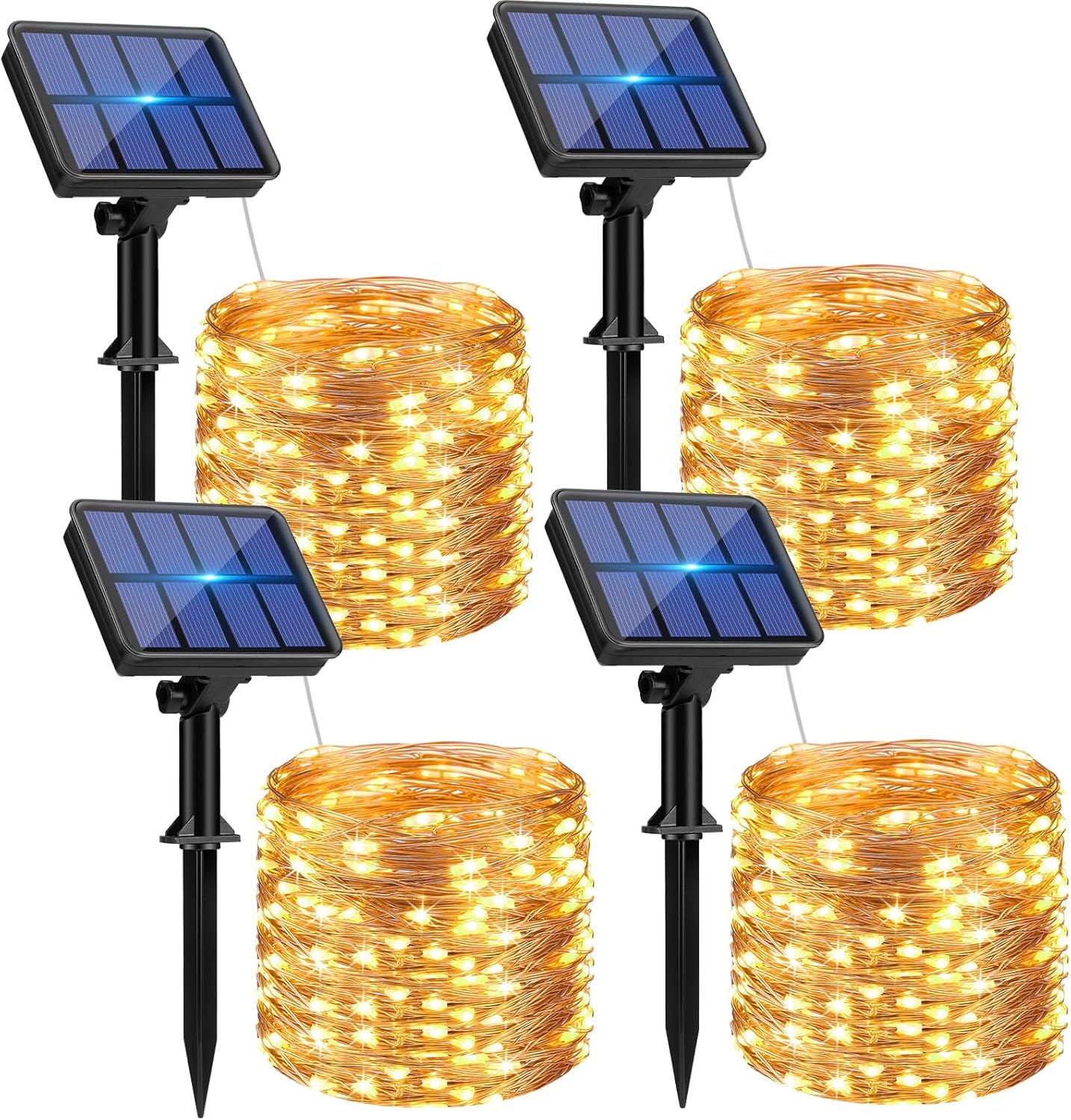 Solar copper wire lights glowing in a garden setting with 80 LEDs per string.