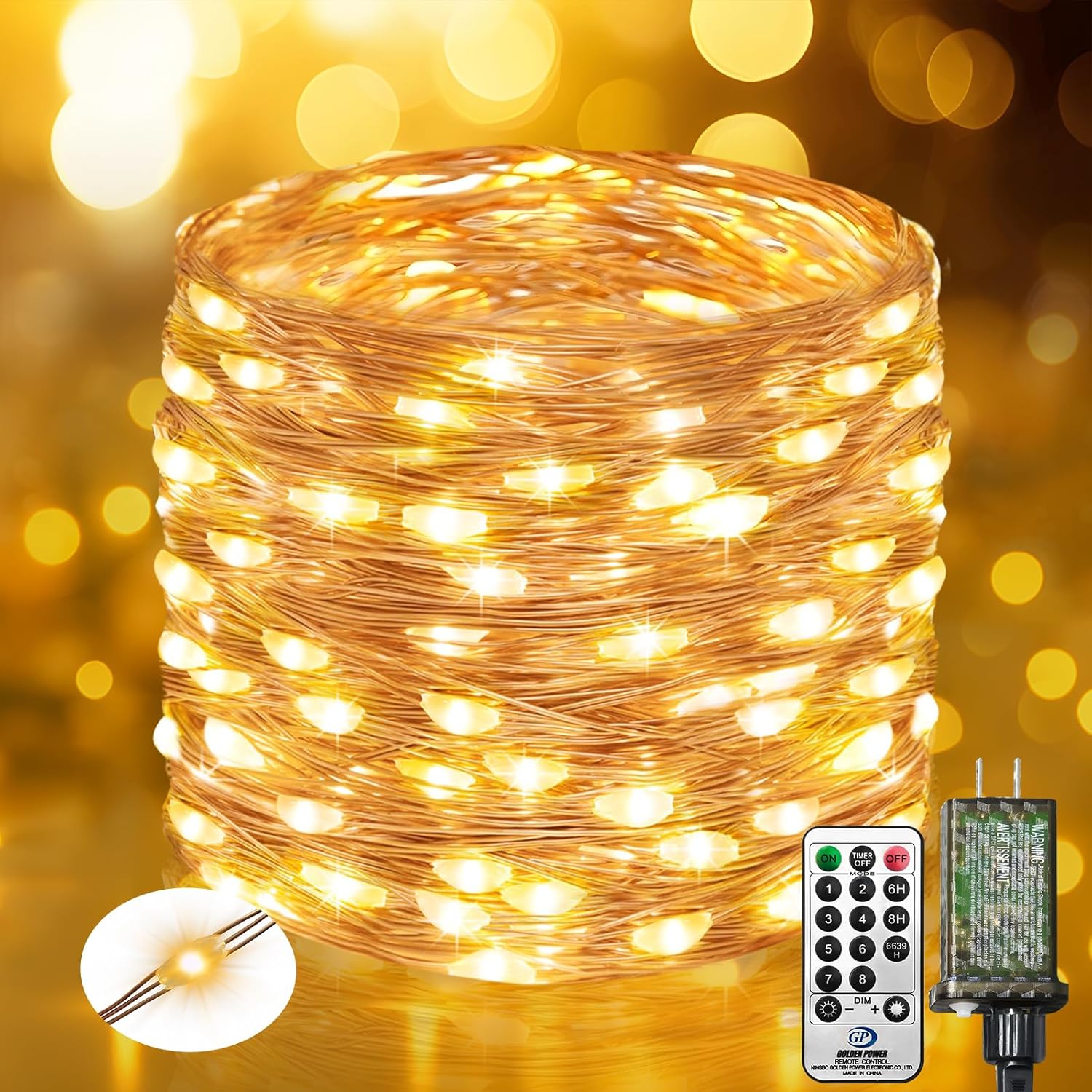 33FT 100 LED copper wire fairy lights with warm white glow on dark background